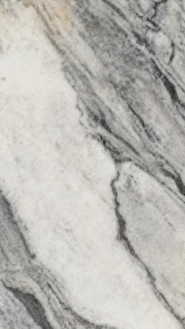 Continuous Pattern panel finish: continuous marble look, warm gray with soft diagonal veining
