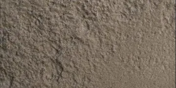 Concrete Board panel finish: concrete board look, brown-gray with coarse stone texture
